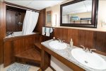 Enjoy a Japanese soaking Jacuzzi tub in the lower level bathroom